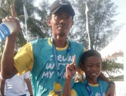 Solikin beserta Anaknya, Petani Berakit Juarai Bintan Marathon 2019